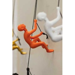 6" x 3" x 3" Resin Orange Climbing Man